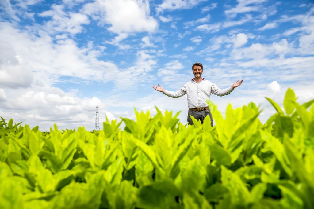 Environmental business portrait of farmer in Sussex countryside