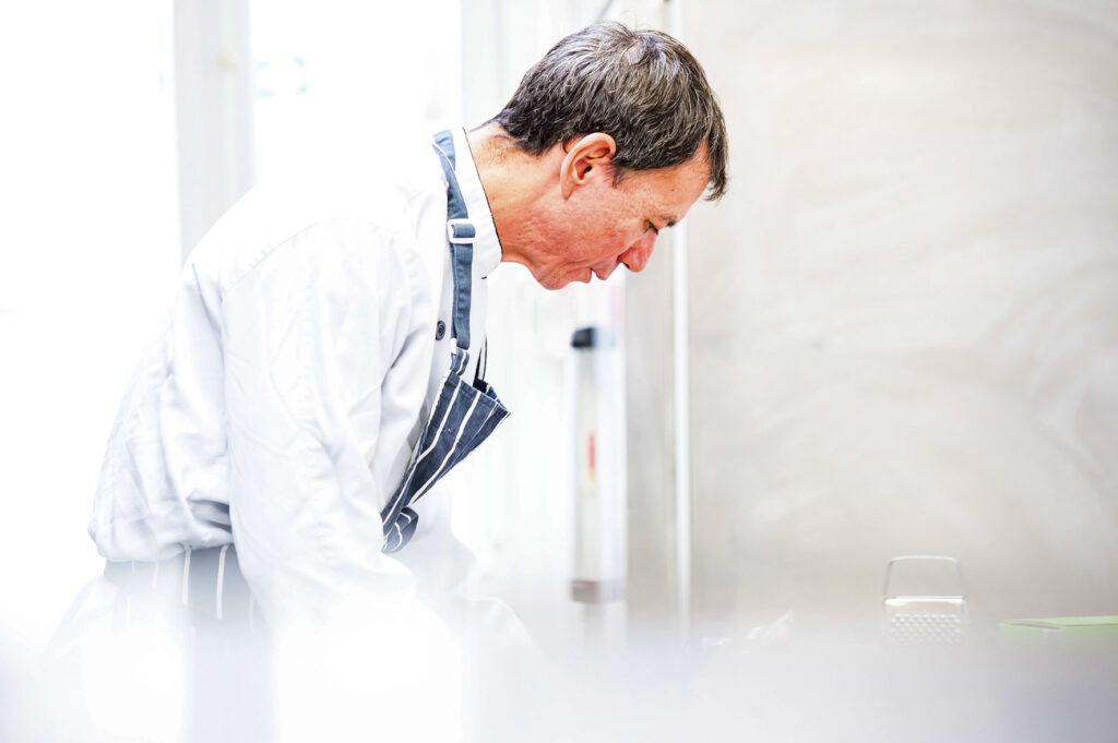brand portrait photography of professional chef in Sussex restaurant kitchen